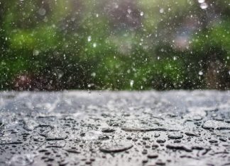 Dežne kaplje kot simbol izpiranja kemikalij iz atmosfere na zemeljsko površje